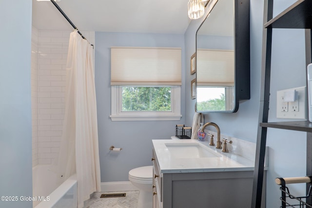 21 St Charles Pl, Saratoga Springs, NY 12866 - full bathroom featuring vanity, toilet, shower / bath combo, and baseboards