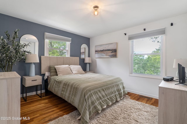 21 St Charles Pl, Saratoga Springs, NY 12866 - bedroom with baseboards and wood finished floors