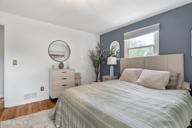 21 St Charles Pl, Saratoga Springs, NY 12866 - bedroom featuring wood finished floors and baseboards