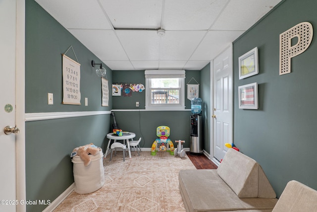 21 St Charles Pl, Saratoga Springs, NY 12866 - playroom with a paneled ceiling and baseboards