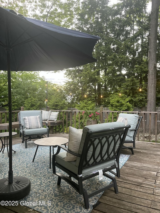 21 St Charles Pl, Saratoga Springs, NY 12866 - wooden terrace featuring an outdoor living space