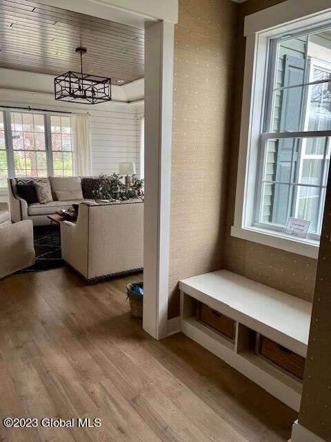 mudroom with plenty of natural light and light wood-type flooring