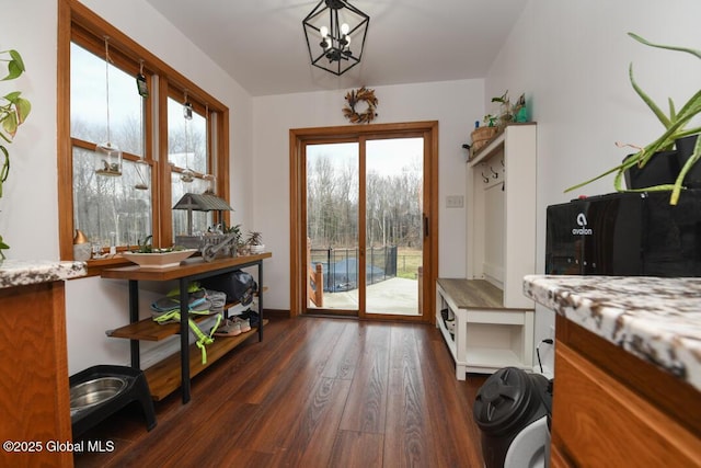2196 Darrow Rd, Duanesburg, NY 12056 - doorway to outside featuring dark wood-type flooring and a notable chandelier