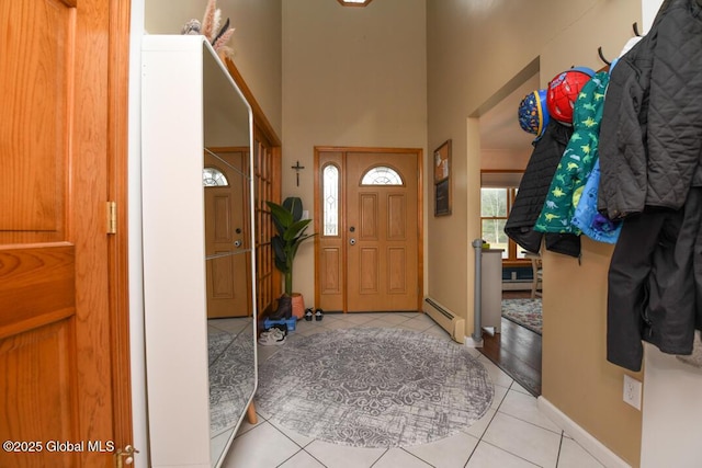 2196 Darrow Rd, Duanesburg, NY 12056 - tiled entrance foyer with baseboard heating and baseboards