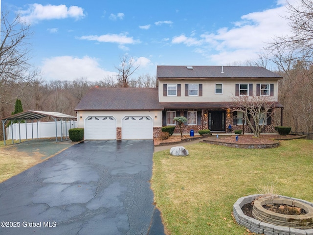 63 Pawling Ave, Mechanicville, NY 12118 - view of front of property with a front lawn, driveway, a detached carport, an attached garage, and fence