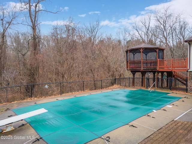 63 Pawling Ave, Mechanicville, NY 12118 - view of swimming pool with a diving board, stairway, fence, a gazebo, and a fenced in pool