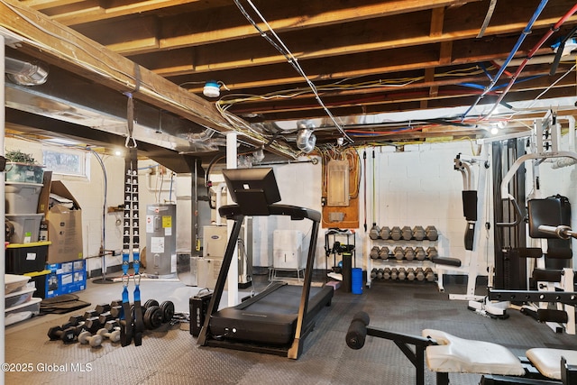 exercise room featuring water heater
