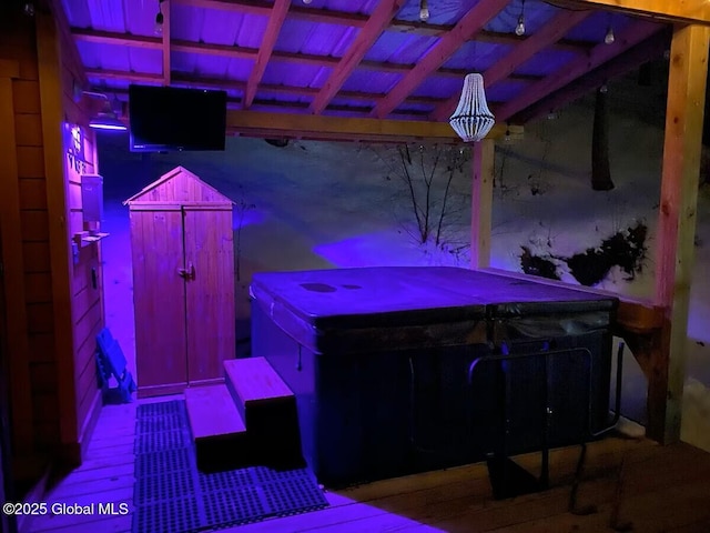 view of patio / terrace with a covered hot tub
