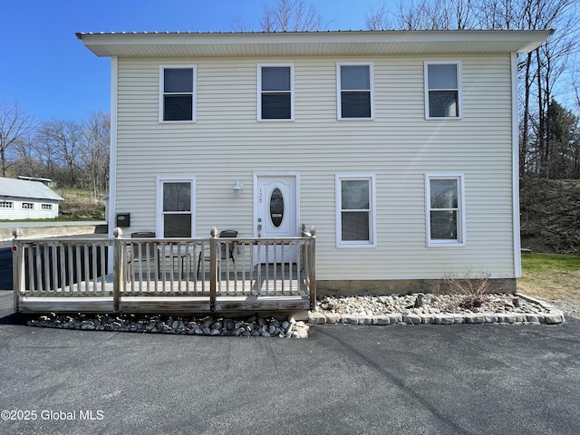 view of front of home featuring a wooden deck