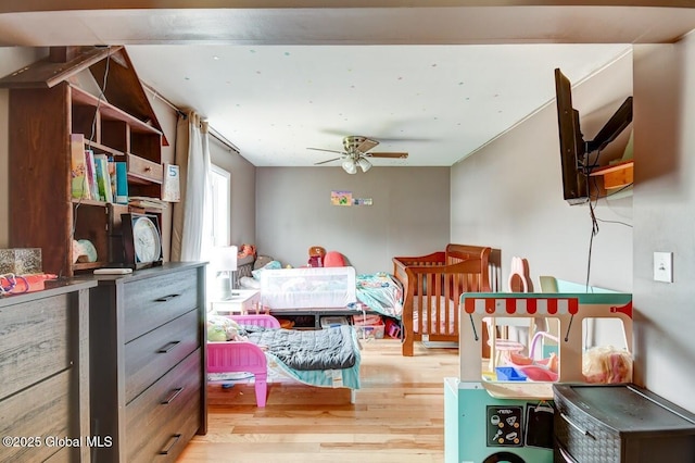 bedroom with wood finished floors