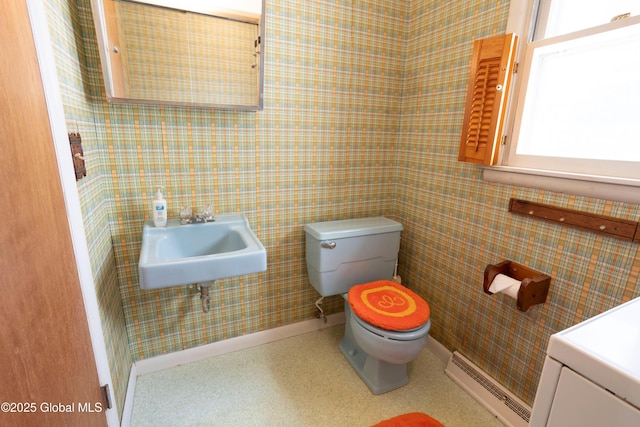 19 Centennial Dr, Queensbury, NY 12804 - bathroom with a baseboard radiator, toilet, and a sink