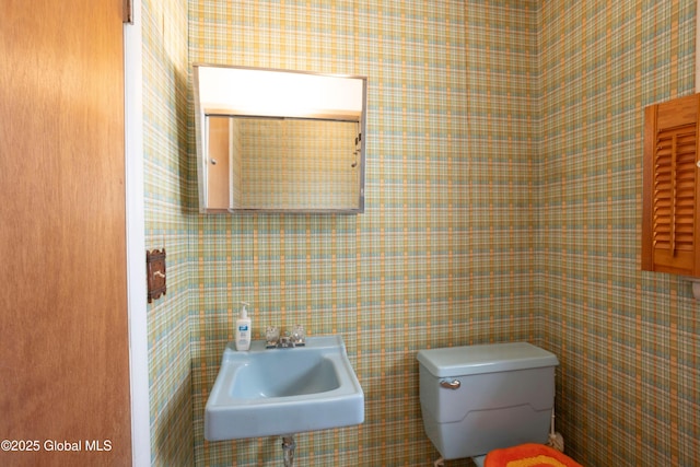 19 Centennial Dr, Queensbury, NY 12804 - bathroom featuring a sink, toilet, and tile walls