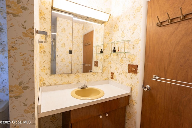 19 Centennial Dr, Queensbury, NY 12804 - bathroom with vanity and wallpapered walls