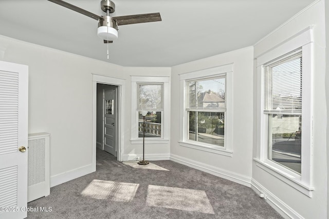 1261-1263 The Plz, Schenectady, NY 12308 - empty room with carpet floors, a ceiling fan, and baseboards