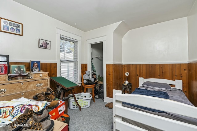 1261-1263 The Plz, Schenectady, NY 12308 - carpeted bedroom with wooden walls, wainscoting, and a closet