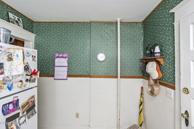 1261-1263 The Plz, Schenectady, NY 12308 - interior space featuring freestanding refrigerator, crown molding, tile walls, wallpapered walls, and a wainscoted wall