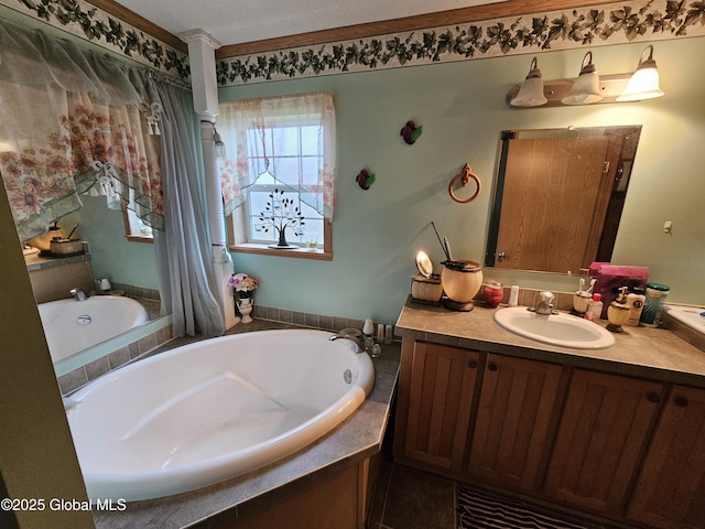 bathroom featuring a bath and vanity