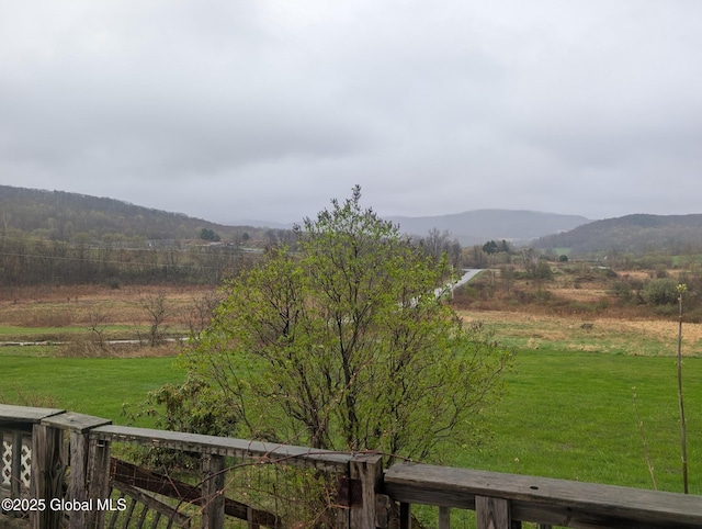 view of mountain feature with a rural view