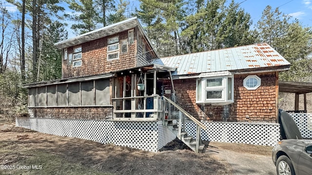 185 Old Schroon Rd, Schroon, NY 12870 - view of front of home with metal roof