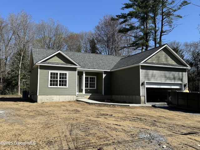 2 Birch Dr, Moreau, NY 12828 - view of front facade with covered porch and roof with shingles