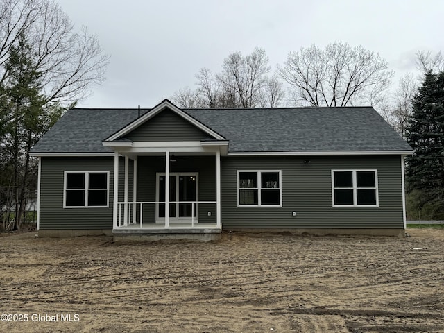 2 Birch Dr, Moreau, NY 12828 - back of property featuring covered porch, a ceiling fan, and roof with shingles
