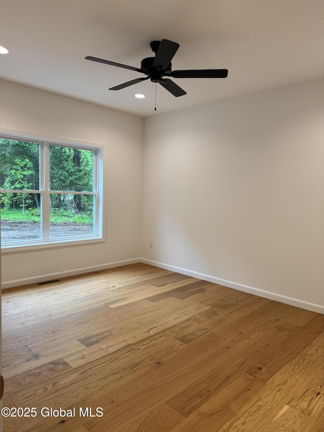 2 Birch Dr, Moreau, NY 12828 - empty room with wood finished floors, recessed lighting, and a ceiling fan