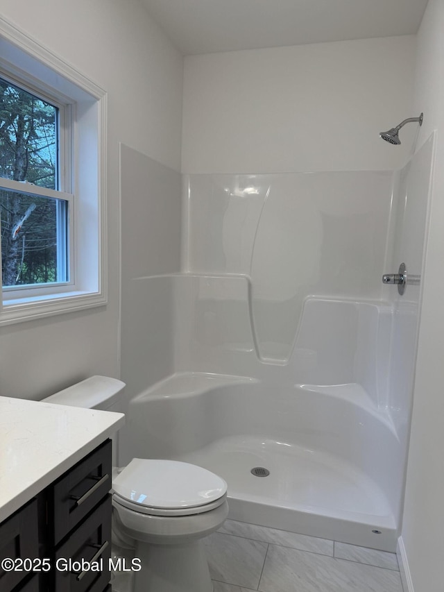 2 Birch Dr, Moreau, NY 12828 - full bath featuring vanity, a shower, and marble look tile flooring