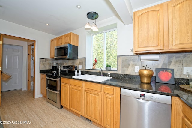 107 Wilderness Way, Stephentown, NY 12169 - kitchen featuring appliances with stainless steel finishes, decorative backsplash, light wood finished floors, and recessed lighting
