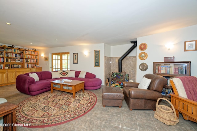 107 Wilderness Way, Stephentown, NY 12169 - tiled living area with a wood stove and recessed lighting