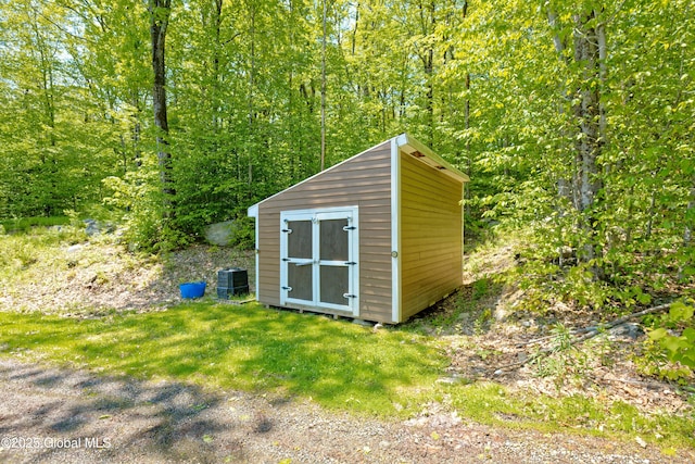 107 Wilderness Way, Stephentown, NY 12169 - view of shed featuring a view of trees