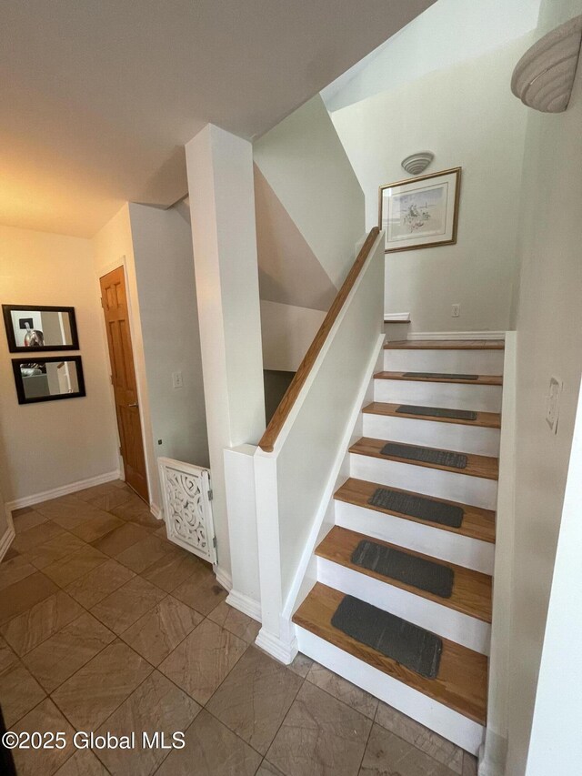 107 Wilderness Way, Stephentown, NY 12169 - stairway with marble look tile flooring and baseboards