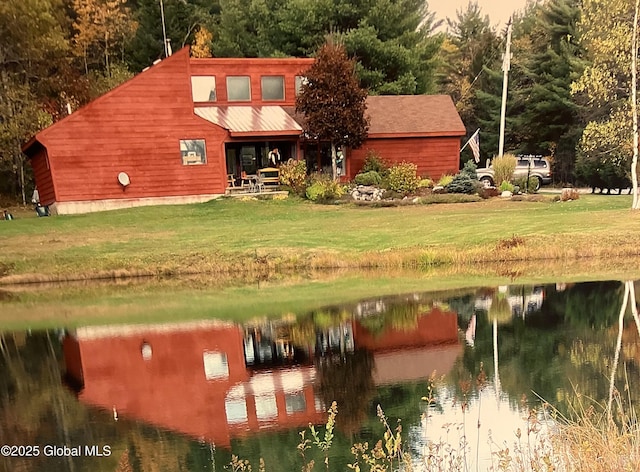 1486 County Highway 112, Caroga, NY 12032 - back of house featuring a yard and a water view
