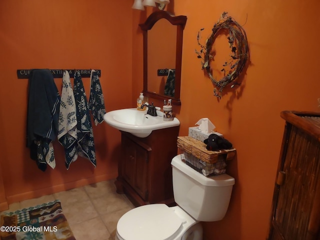 1486 County Highway 112, Caroga, NY 12032 - half bathroom with toilet, tile patterned flooring, and vanity