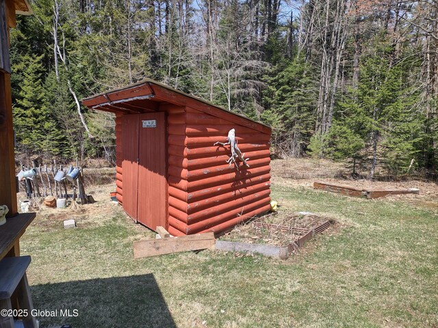 1486 County Highway 112, Caroga, NY 12032 - view of shed featuring a view of trees