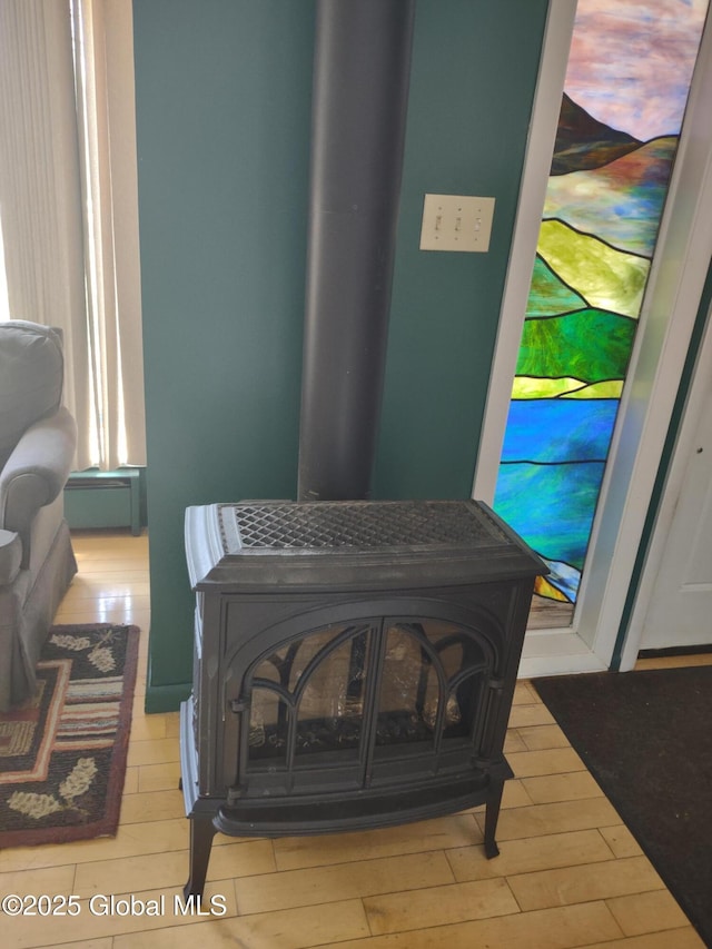 1486 County Highway 112, Caroga, NY 12032 - interior details featuring a wood stove and wood finished floors