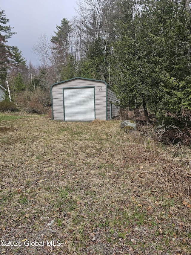 exterior space with a storage shed