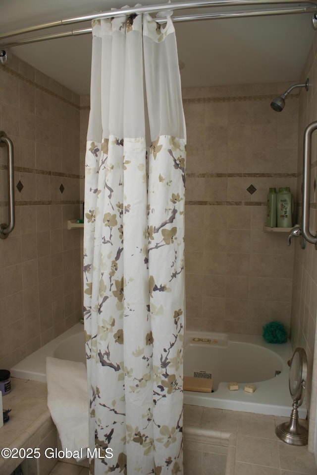 full bathroom featuring shower / bath combo and tile patterned flooring
