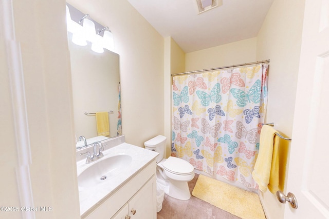 bathroom with vanity, a shower with shower curtain, toilet, and visible vents