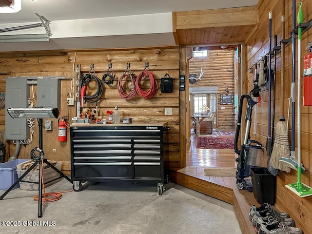 25 Birch Dr, Bolton, NY 12824 - garage with a workshop area and a garage door opener