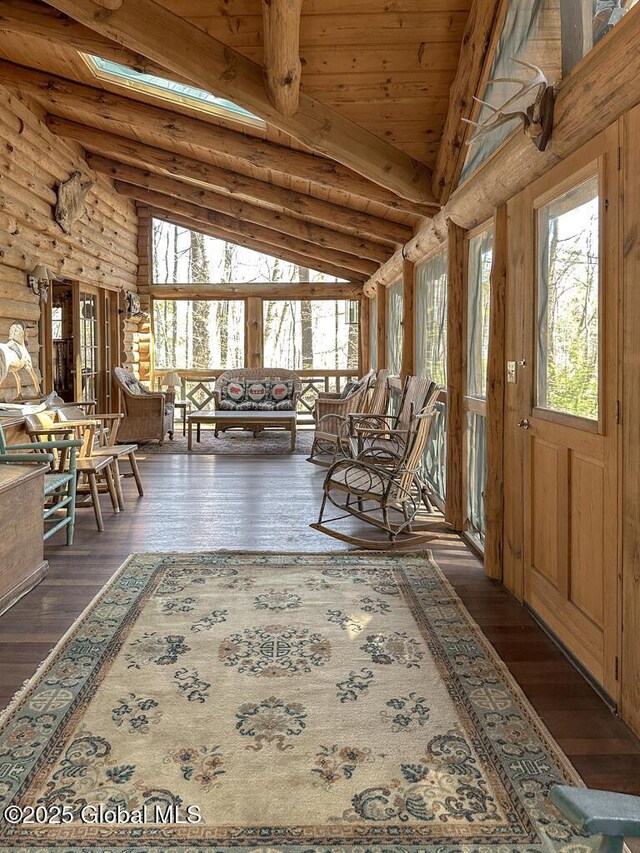 25 Birch Dr, Bolton, NY 12824 - sitting room featuring beamed ceiling, hardwood / wood-style flooring, wooden ceiling, log walls, and high vaulted ceiling