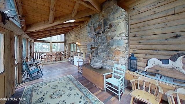 25 Birch Dr, Bolton, NY 12824 - living area featuring beam ceiling, wood ceiling, log walls, wood finished floors, and high vaulted ceiling