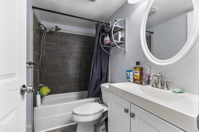 bathroom featuring shower / bath combo with shower curtain, toilet, and vanity
