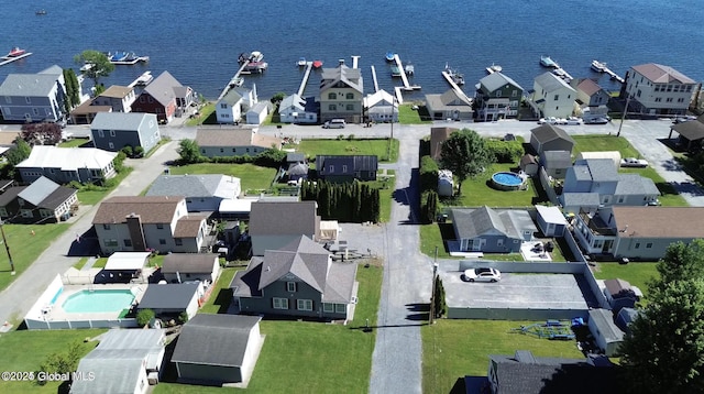 aerial view with a residential view and a water view
