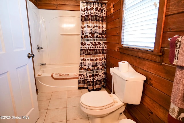 full bathroom with toilet, tile patterned floors, and shower / tub combo