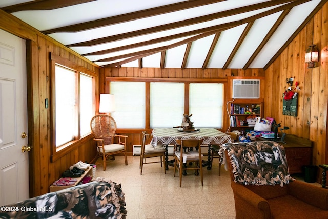 sunroom / solarium featuring a wall unit AC and beam ceiling