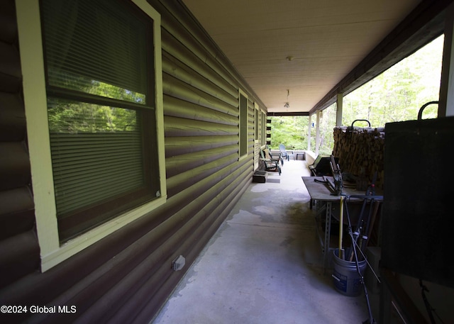 view of patio featuring a porch