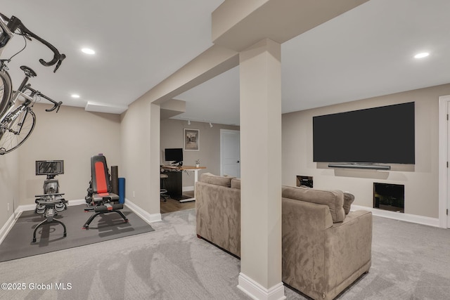interior space with carpet floors, baseboards, and recessed lighting