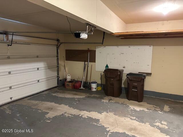 garage featuring a garage door opener