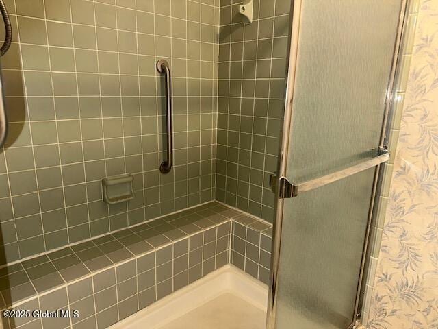 bathroom with a stall shower