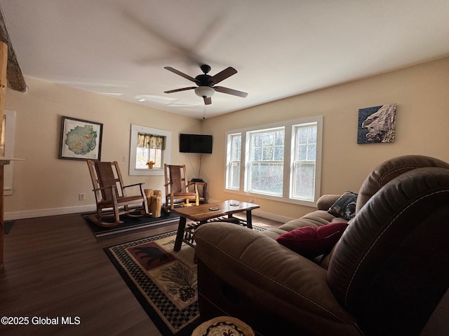 living area featuring ceiling fan, wood finished floors, and baseboards